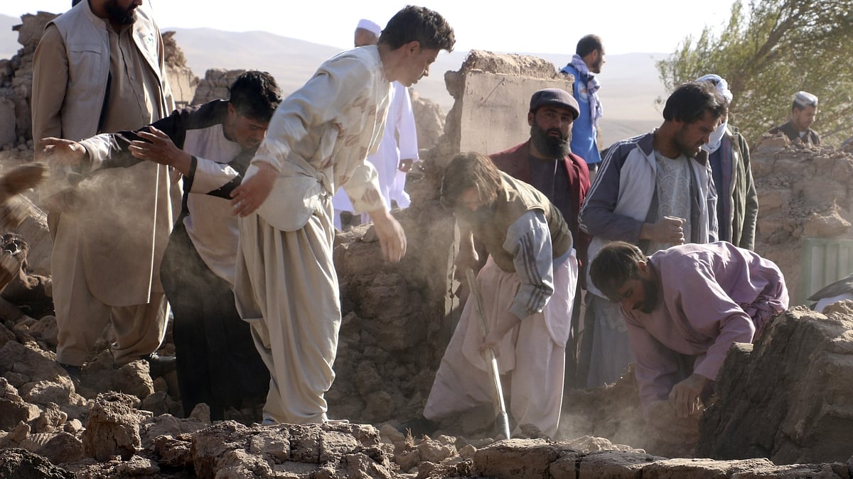 <div class="paragraphs"><p>Afghan men and rescue teams in a race against time, searching for victims following a powerful 6.3 magnitude earthquake.</p></div>
