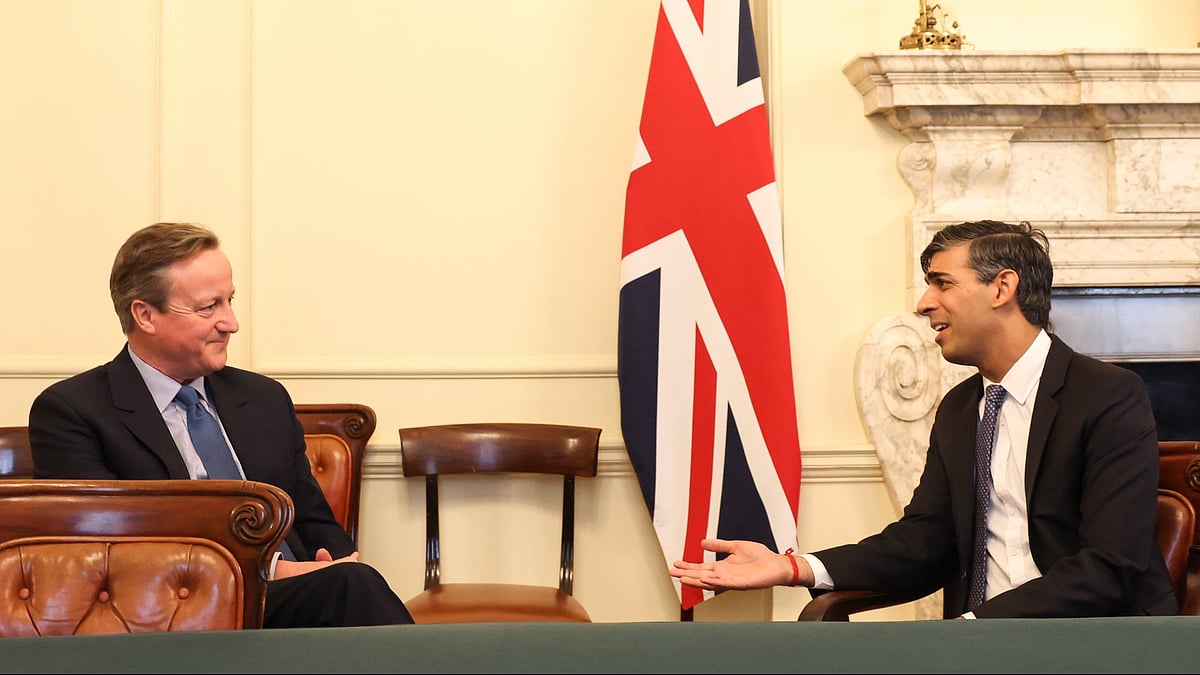 <div class="paragraphs"><p>David Cameron and Rishi Sunak.</p></div>
