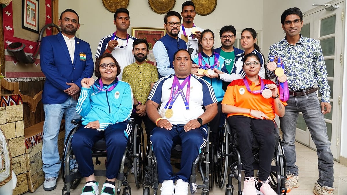 <div class="paragraphs"><p>Union Minister for Youth Affairs & Sports and Information & Broadcasting Shri Anurag Singh Thakur with para athletes at his residence.</p></div>