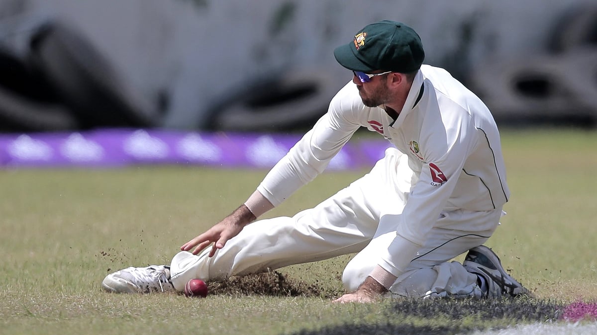 Glenn Maxwell fields the ball during a Test match.