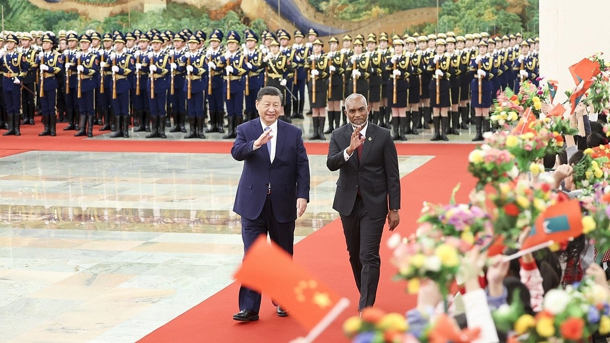 <div class="paragraphs"><p>Xi Jinping and&nbsp;Mohamed Muizzu.</p></div>
