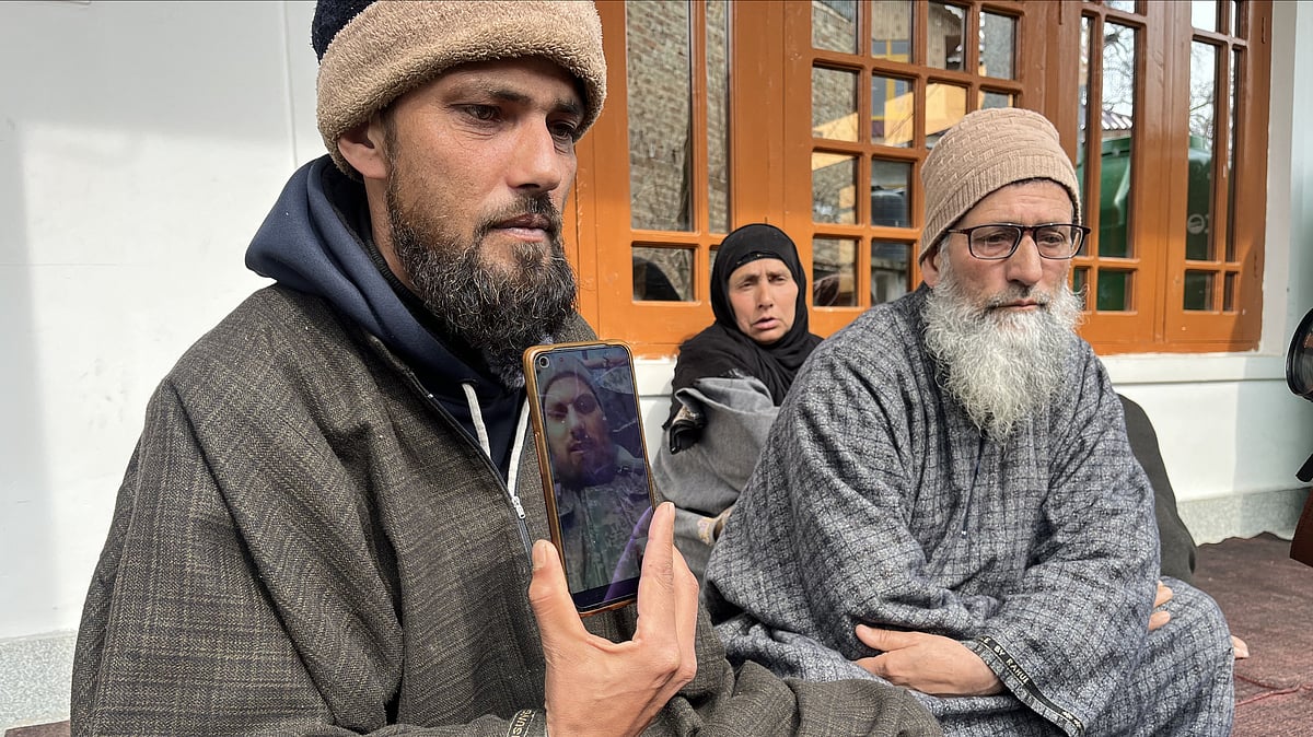 <div class="paragraphs"><p>Sajad Ahmad claims that he is in contact with his brother through a messaging app.</p></div>
