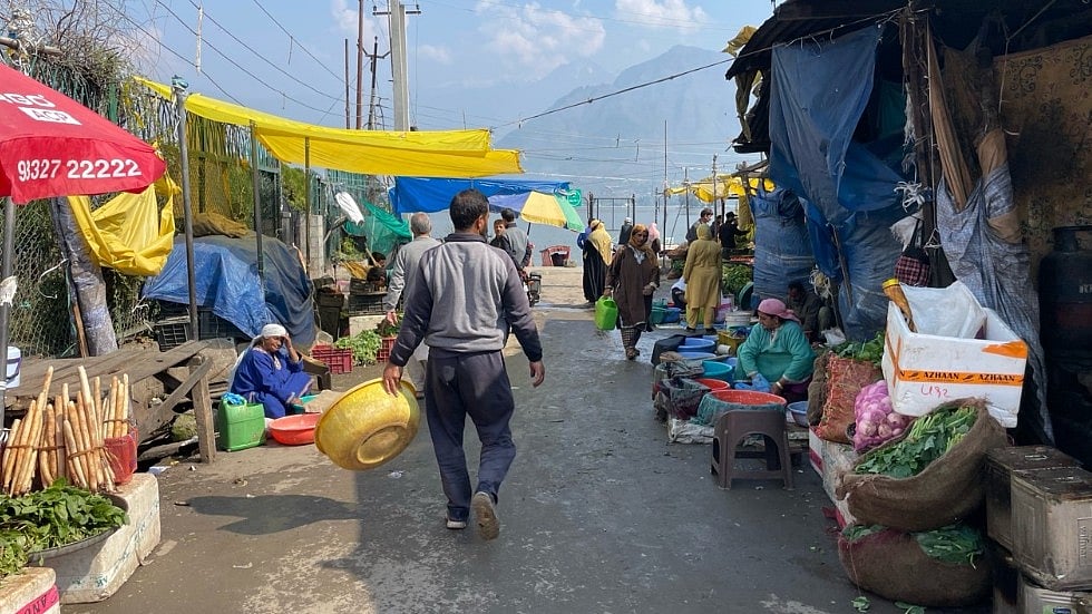 <div class="paragraphs"><p>View of Hazartbal Market, where Hanji Women sell Fish on the Roadside. </p></div>