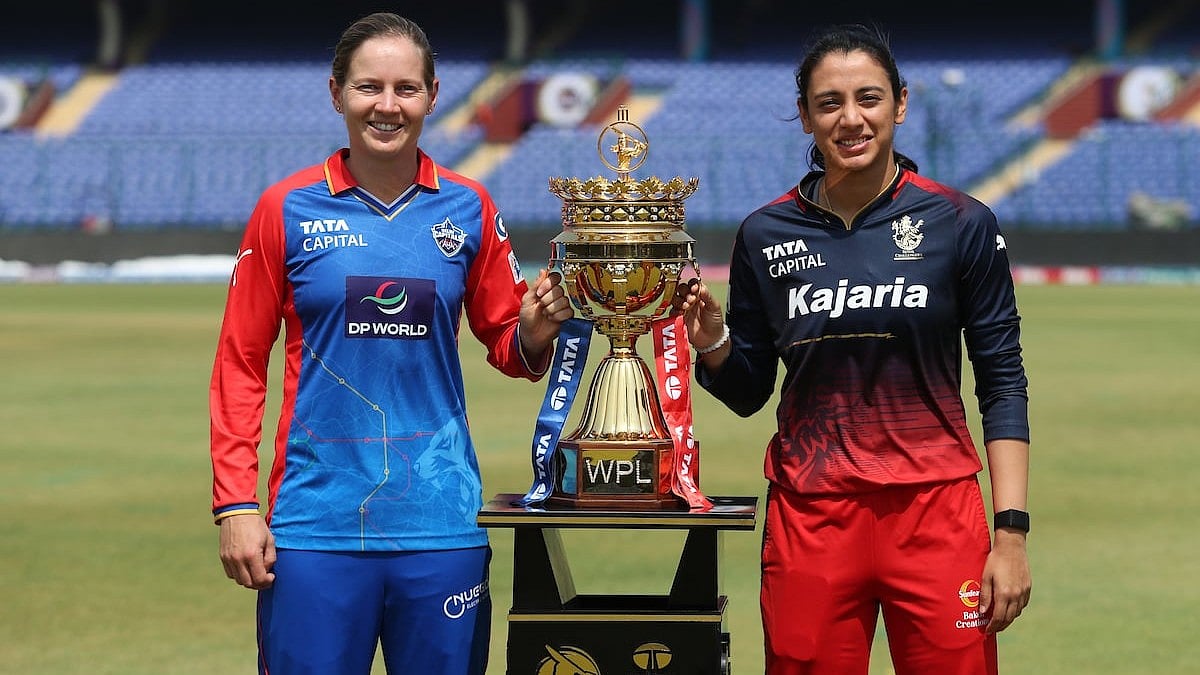 <div class="paragraphs"><p>Meg Lanning captain of Delhi Capitals and Smriti Mandhana captain of Royal Challengers Bangalore with WPL trophy during the press conference ahead of the final between Delhi Capitals and Royal Challengers Bangalore held at the Arun Jaitley Stadium, New Delhi on 16 March 2024.</p></div>