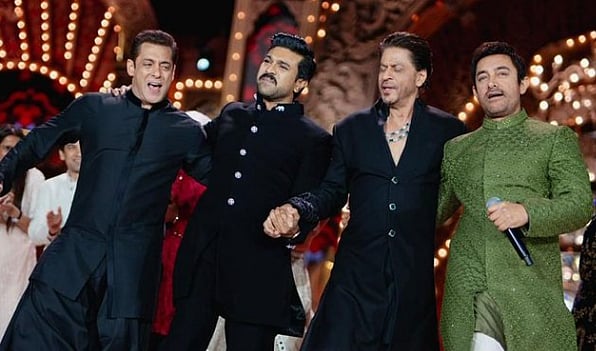 <div class="paragraphs"><p>SRK, Aamir Khan and Ram Charan while recreating the iconic dance moves from RRR. </p></div>