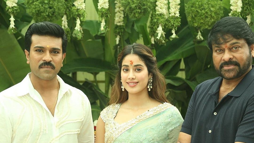<div class="paragraphs"><p>Janhvi Kapoor, Chiranjeevi and Ram Charan at the launch of <em>RC16</em>.</p></div>