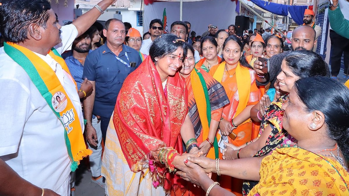 <div class="paragraphs"><p>Madhavi Latha greeting her supporters.</p></div>
