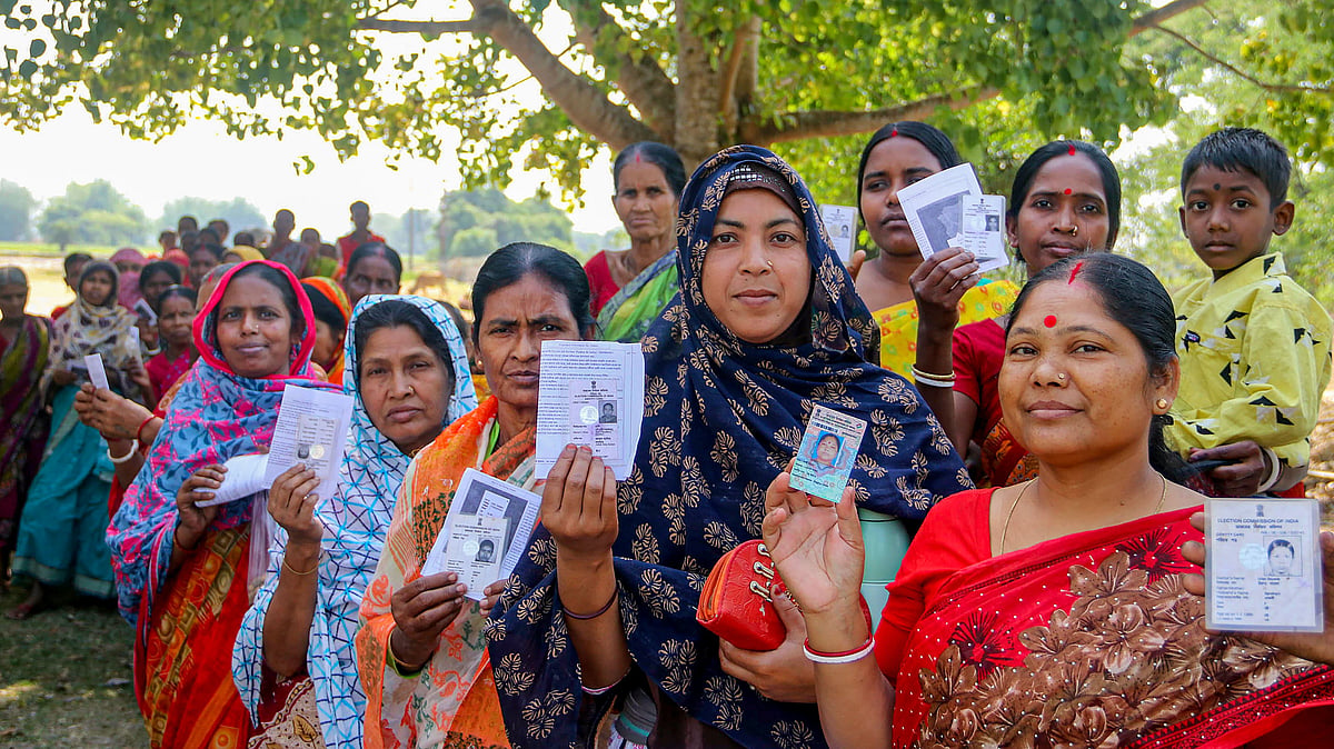 <div class="paragraphs"><p>Image used for representation only. South Dinajpur: Women voters show their ID cards as they wait to cast their votes for the second phase of Lok Sabha elections. Image used for representation only.&nbsp;</p></div>