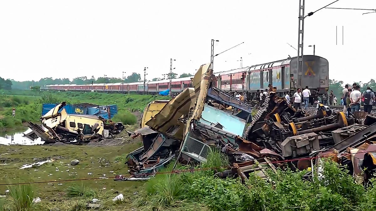 <div class="paragraphs"><p>New Jalpaiguri: A train runs through the accident area following restoration of services a day after the collision between the Kanchanjunga Express and a goods train, near Rangapani railway station, Tuesday, June 18, 2024. Atleast 10 people died and several others were injured in the accident, according to officials.</p></div>