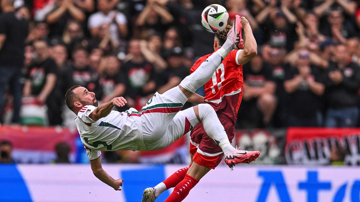 <div class="paragraphs"><p>Hungary's Attila Fiola, left, and Switzerland's Ruben Vargas, right, challenge for the ball during a Group A match between Hungary and Switzerland at the Euro 2024 soccer tournament in Cologne, Germany, Saturday, 15 June, 2024.</p></div>