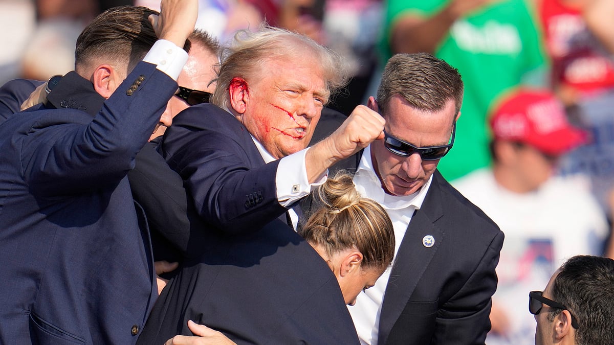 <div class="paragraphs"><p>Republican presidential candidate former President Donald Trump is helped off the stage at a campaign event in Butler, Pa., on Saturday, 13 July 2024.</p></div>