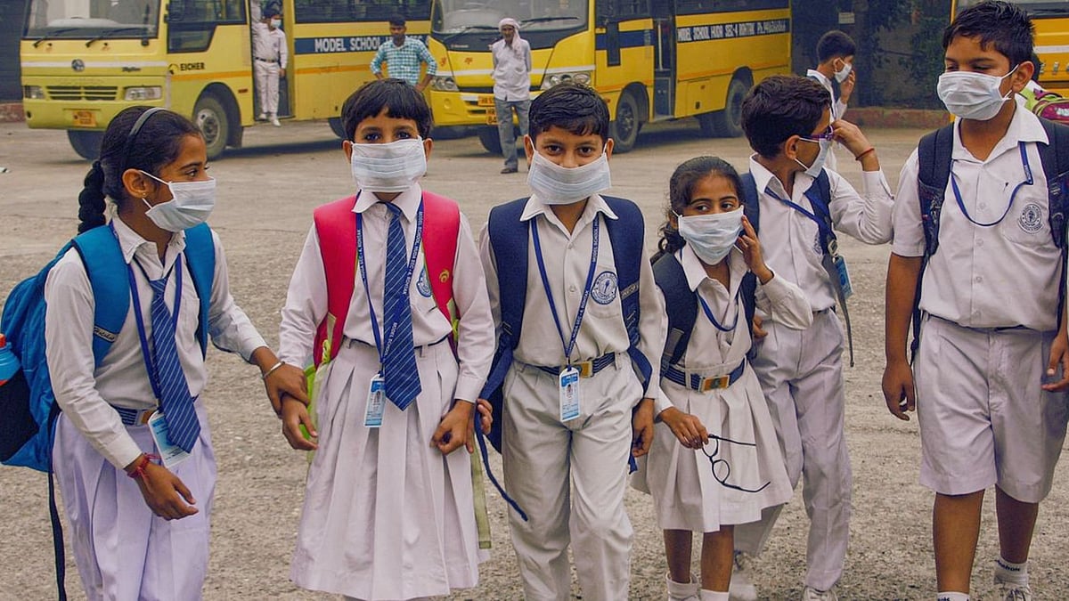 <div class="paragraphs"><p>School students wearing masks in Rohtak on Saturday.</p></div>