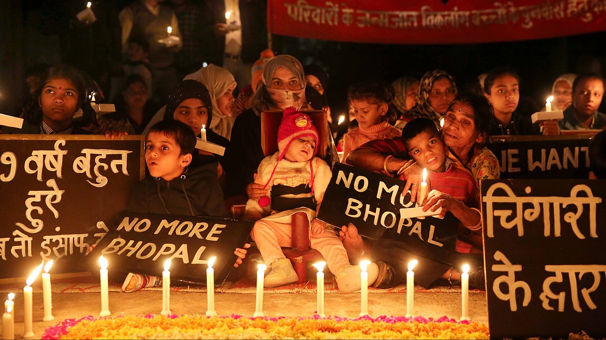 <div class="paragraphs"><p>Children with congenital disabilities, believed to be caused by the exposure of their parents to gas leakage during the Union Carbide gas leak disaster in 1984, along with their relatives and supporters take part in a candle light vigil to pay homage to the victims of the tragedy, in Bhopal, Thursday, Nov. 30, 2023.</p></div>
