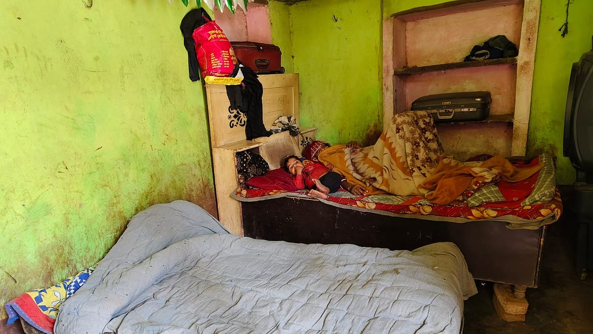 <div class="paragraphs"><p>Razeeda Meo, 26, grieves inside her house in Alwar where her newborn was recently killed during a police raid.</p></div>