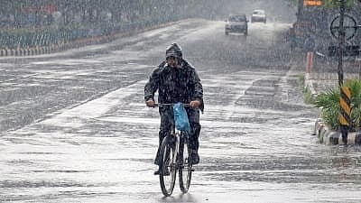 <div class="paragraphs"><p>Bengaluru: A cyclist wades through heavy rain at Cubbon road in Bengaluru on Monday, Sept. 26, 2022. (Image for representational purpose only.)</p></div>