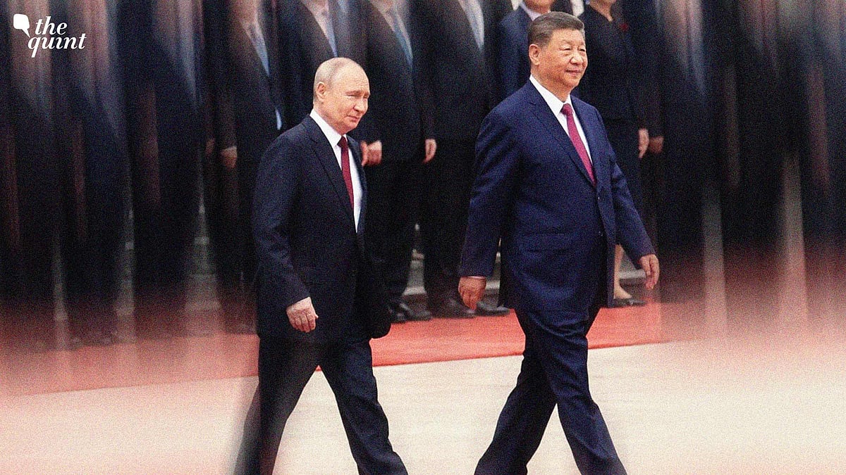 <div class="paragraphs"><p>Russian President Vladimir Putin walks with Chinese President Xi Jinping during a welcoming ceremony at the Great Hall of the People in Beijing last week.</p></div>