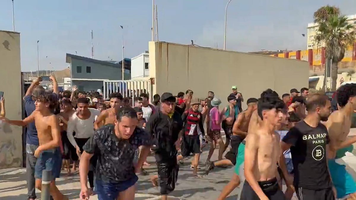 <div class="paragraphs"><p>18 Killed as Thousands Breach Border Between Morocco & Spanish Enclave of Ceuta</p></div>