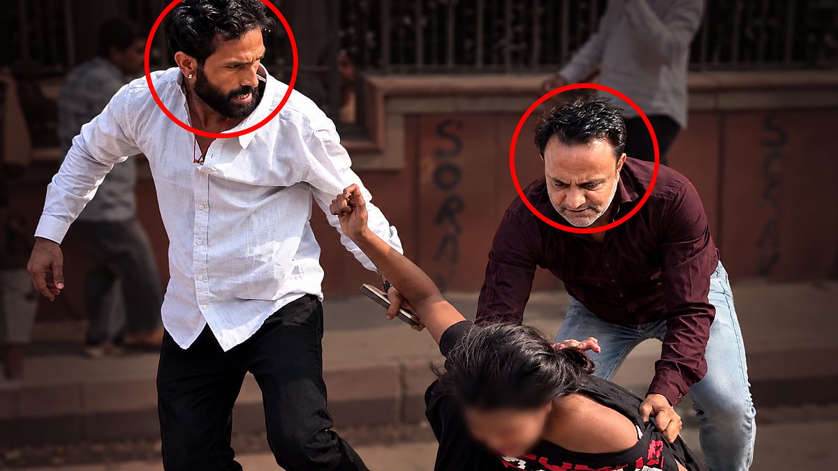 <div class="paragraphs"><p>(Two men were caught on camera assaulting a young protester)</p></div>