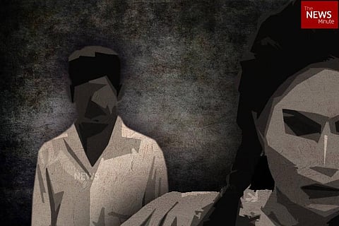 A pictorial image of a man standing behind a woman