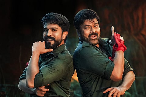 Ram Charan and Chiranjeevi in Acharya poster