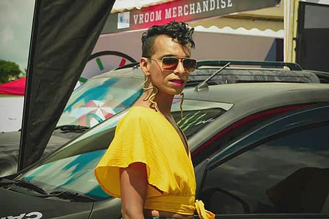 Adam Pasha in a yellow shirt 