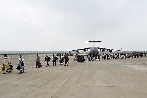 People who were stranded in crisis-hit Afghanistan arrive by a special repatriation flight of IAF
