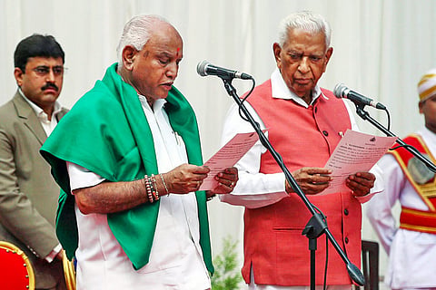 Yeddyurappa sworn in as 23rd Karnataka CM, takes oath amidst Cong-JD(S) protest