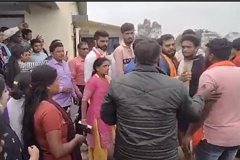 Members of the Bajrang Dal and Christian community fighting