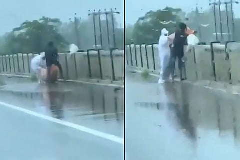 Screengrab from a video from Balrampur of a COVID-19 patient’s body being thrown into river in Uttar Pradesh