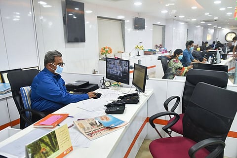 Bank employees at work