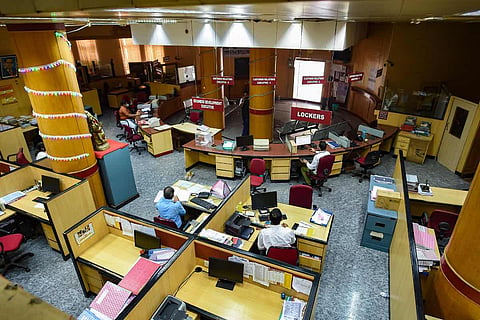An aerial view of banking staff at a bank in India