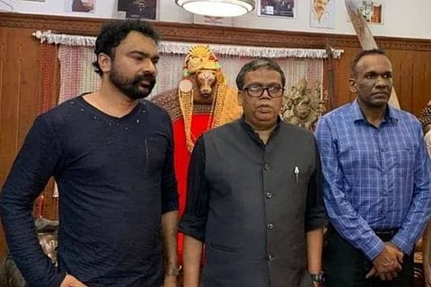Monson Mavunkal with former state police chief Loknath Behera and Manoj Abraham IPS