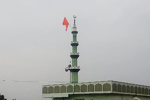 Saffron flag hosted on top of mosque