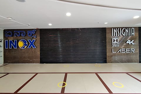 The closed shutters of INOX at Garuda Mall in Bengaluru