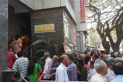 Depositors rush to co-op bank in Bengaluru to withdraw cash after RBI places regulations