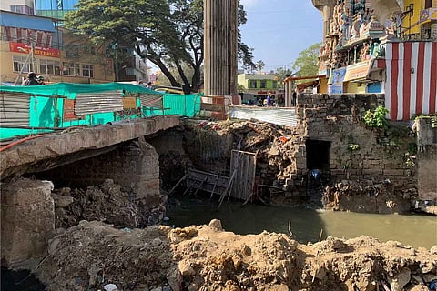 Damaged metro pillar beside a storm water drain in Halasur 