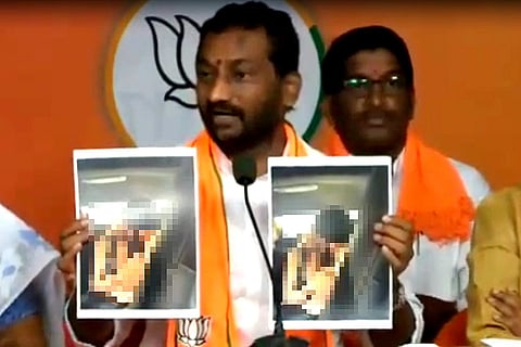 BJP MLA Raghunandan Rao showing photos of the Hyderabad gangrape survivor in the car