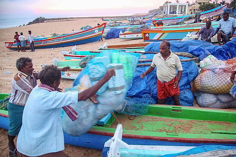 Fishermen in seashore Kanyakumari