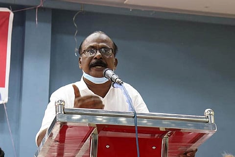 CPI leader CC Mukundan speaking at an event
