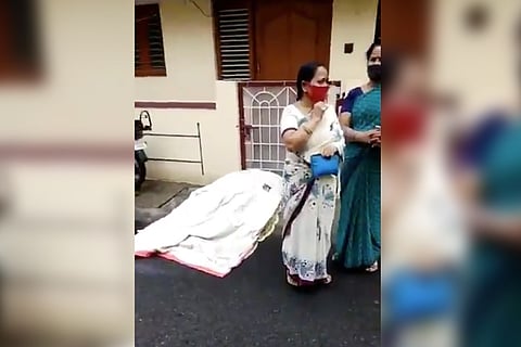 The man collapsed on the road while walking towards the ambulance