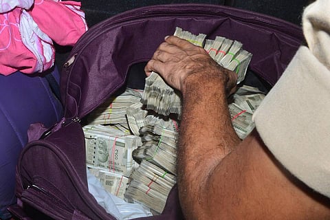 Cash being carried in a bag seized: Rs 4.76 crore cash seized from bus passengers in Andhra