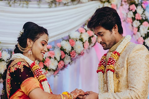 Kannada Television actors Chandan and Kavitha are seen exchanging engagement rings.
