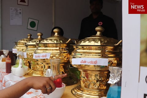 A visitor at the Buva food stall (TNM photo/Nithya Pandian) 