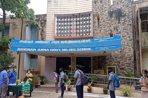 Entrance of a school in Chennai with students standing outside