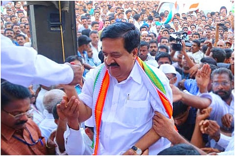 Kerala Opposition Leader Ramesh Chennithala among a crowd who gathered during an Assembly election campaign 