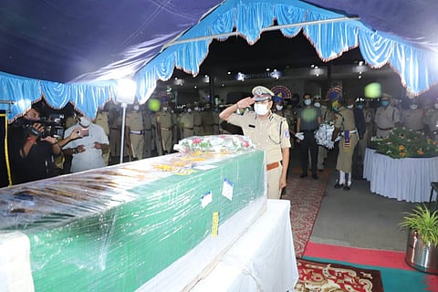 Cyberabad Commissioner of Police VC Sajjanar paying tribute in front of the mortal remains of jawan Shakamuri Murali Krishna 