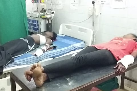The victim Chinnadurai and his sister lying on two beds in the hospital