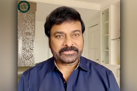  Actor Chiranjeevi is seen wearing a blue shirt in a screengrab from the video.