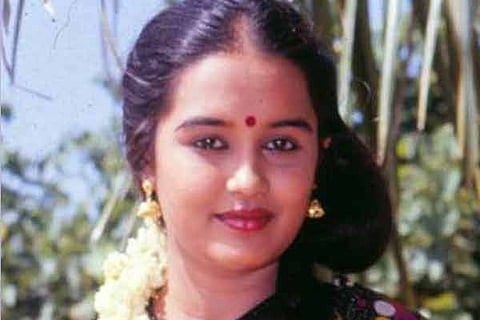 Chitra with flowers and bindi 