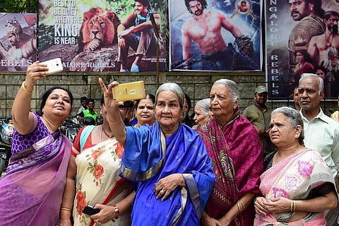 Women outside cinema theatre